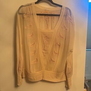 Leifsdottir Cream Embroidered Blouse with beautiful button detailing.